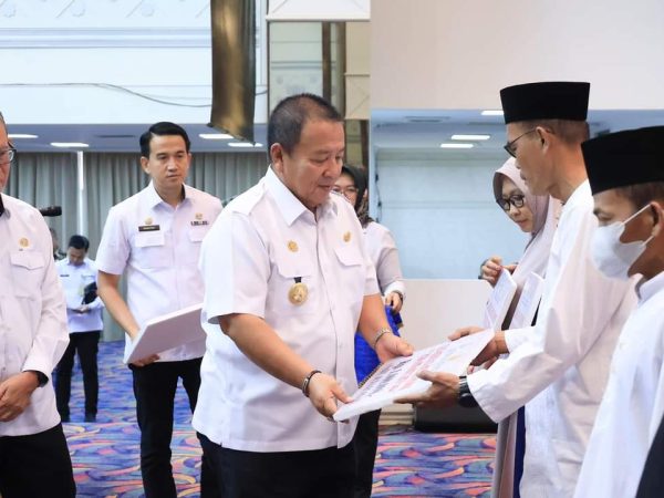 Gubernur Arinal Djunaidi Berikan Piagam, Tali Asih, dan Santunan Bagi Anggota Korpri Provinsi Lampung
